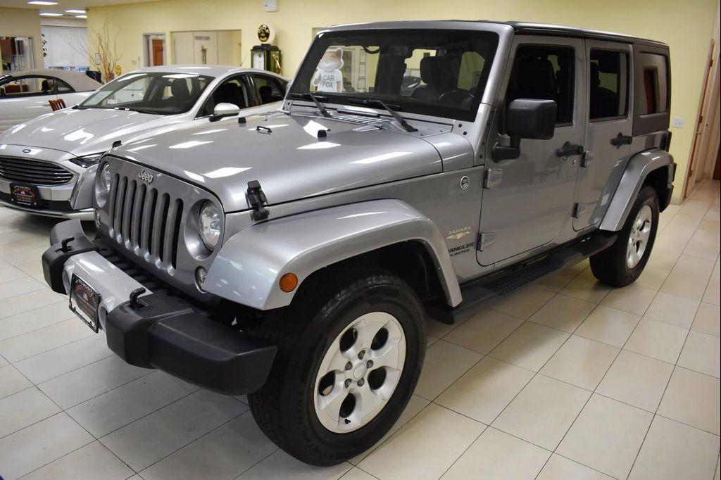 used 2014 Jeep Wrangler Unlimited car, priced at $16,599