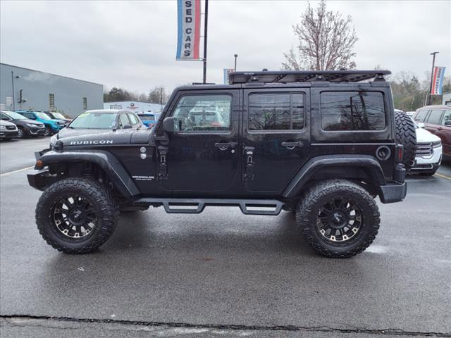 used 2015 Jeep Wrangler Unlimited car, priced at $26,519