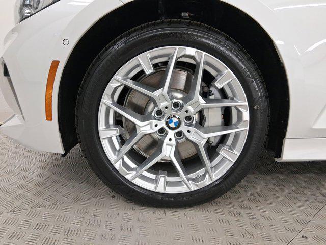 new 2025 BMW 330 car, priced at $50,180