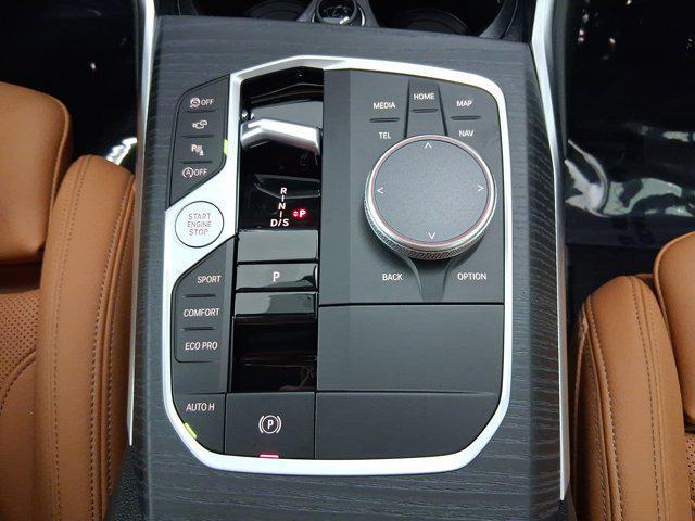 new 2025 BMW 330 car, priced at $50,180