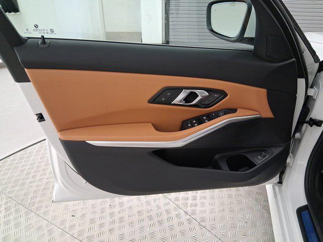 new 2025 BMW 330 car, priced at $50,180