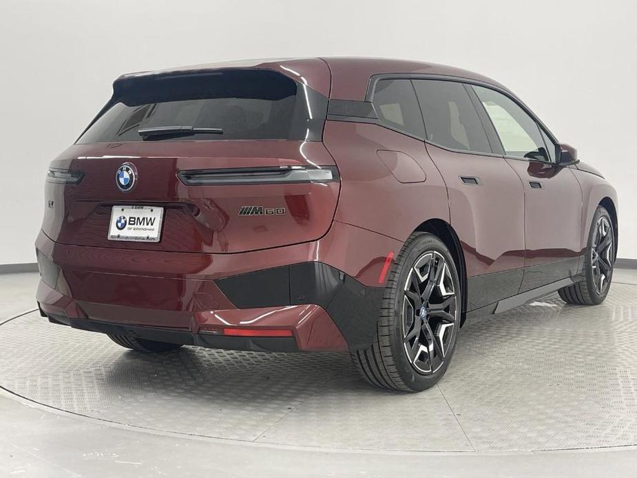 new 2025 BMW iX car, priced at $117,555