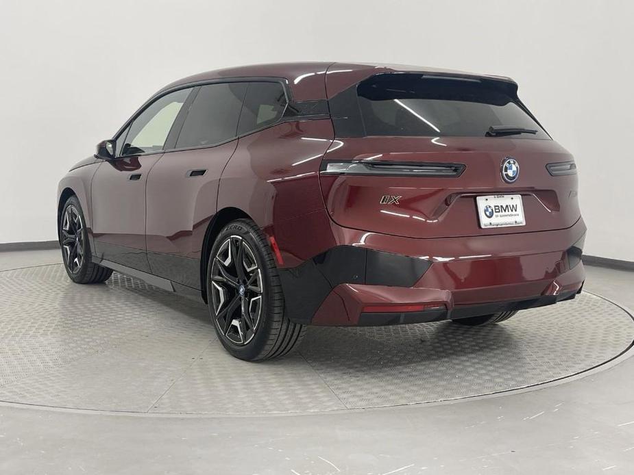 new 2025 BMW iX car, priced at $117,555