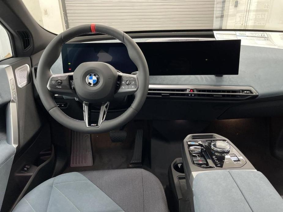 new 2025 BMW iX car, priced at $120,215
