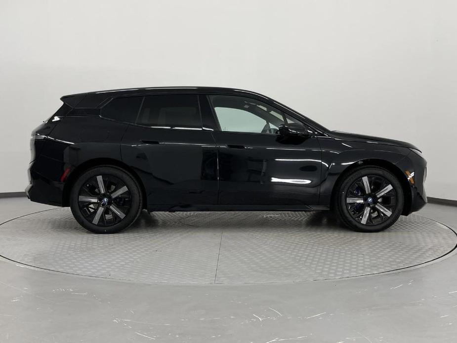 new 2024 BMW iX car, priced at $95,095