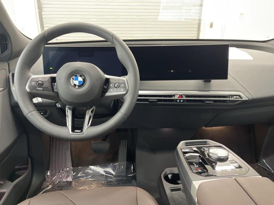 new 2025 BMW iX car, priced at $99,175