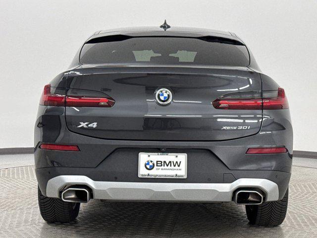 used 2022 BMW X4 car, priced at $31,996