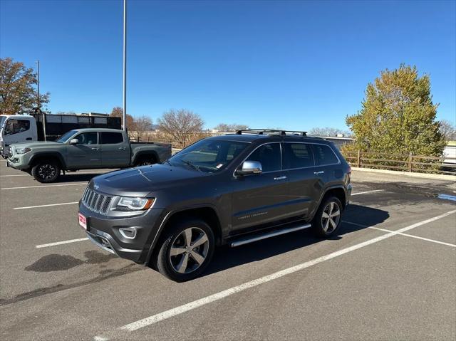 used 2014 Jeep Grand Cherokee car, priced at $15,498