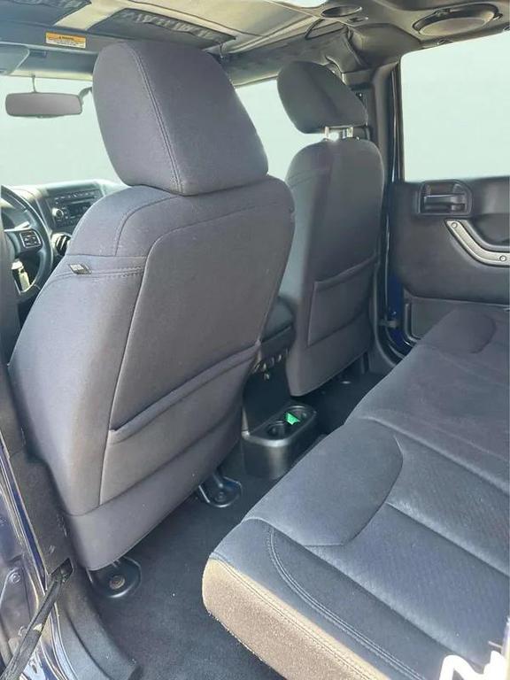 used 2013 Jeep Wrangler Unlimited car, priced at $10,498