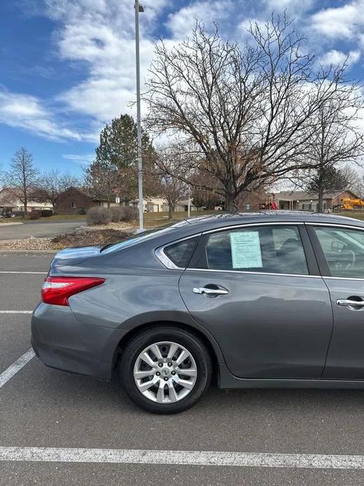 used 2016 Nissan Altima car, priced at $9,998