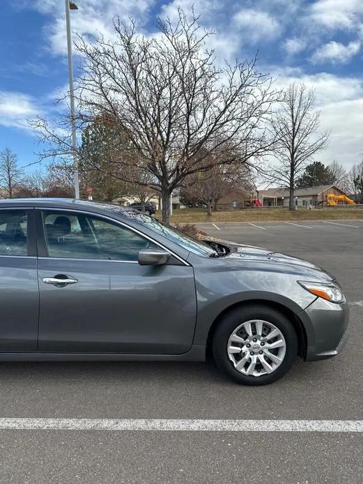 used 2016 Nissan Altima car, priced at $9,998