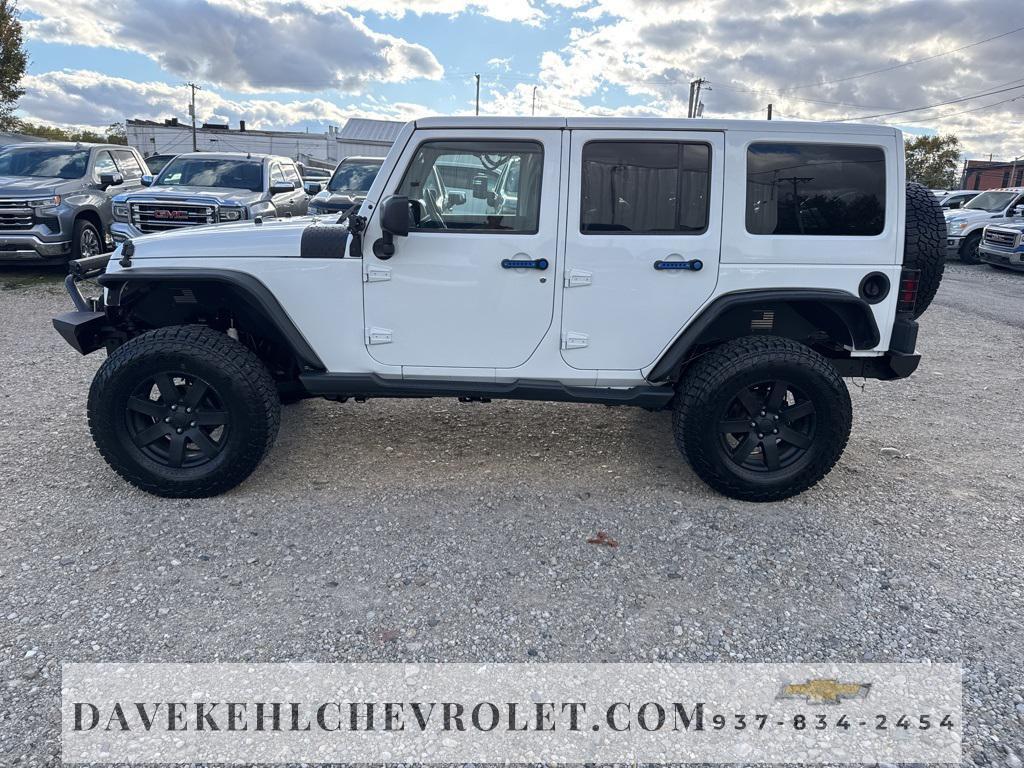 used 2015 Jeep Wrangler Unlimited car, priced at $18,680