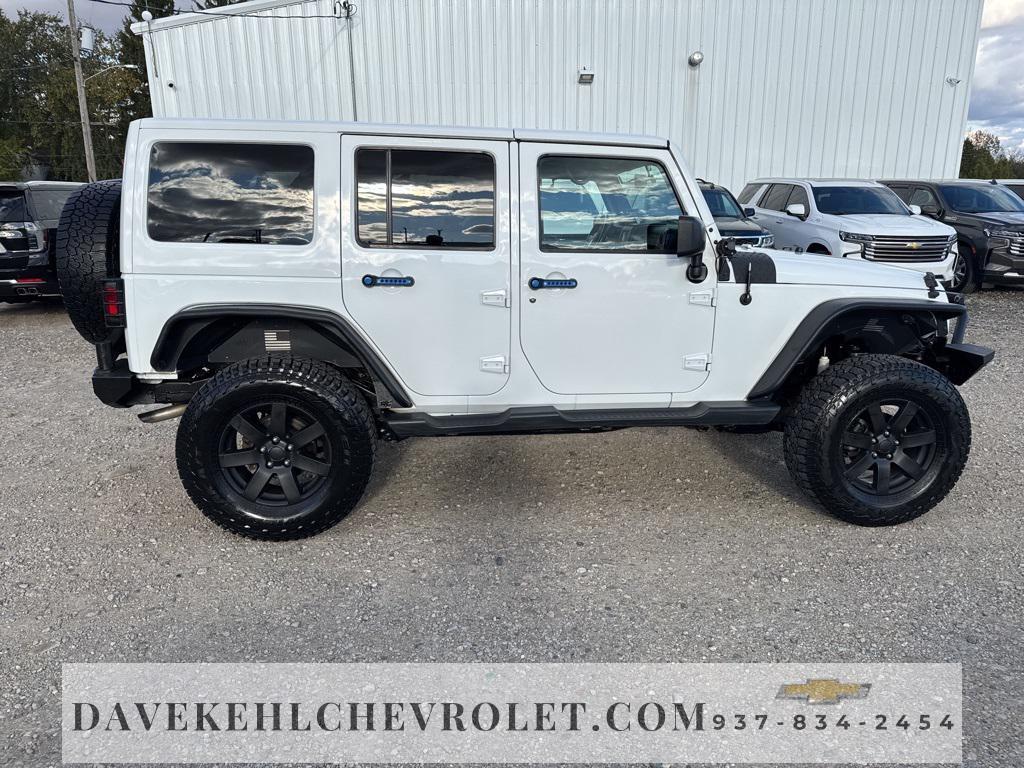 used 2015 Jeep Wrangler Unlimited car, priced at $18,680