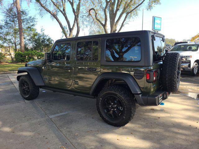 used 2023 Jeep Wrangler 4xe car, priced at $33,435