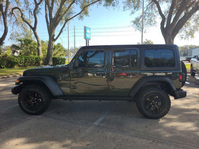 used 2023 Jeep Wrangler 4xe car, priced at $33,435