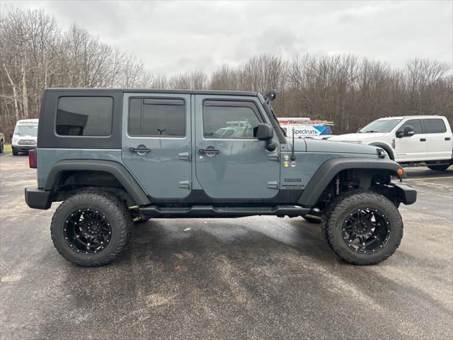 used 2014 Jeep Wrangler Unlimited car, priced at $15,186