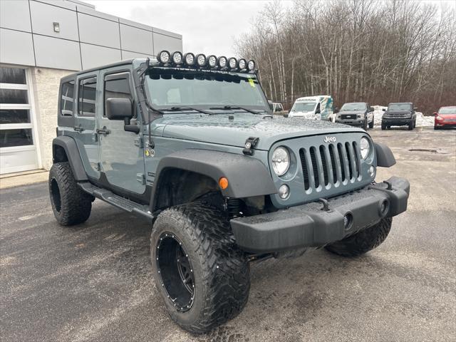 used 2014 Jeep Wrangler Unlimited car, priced at $15,186