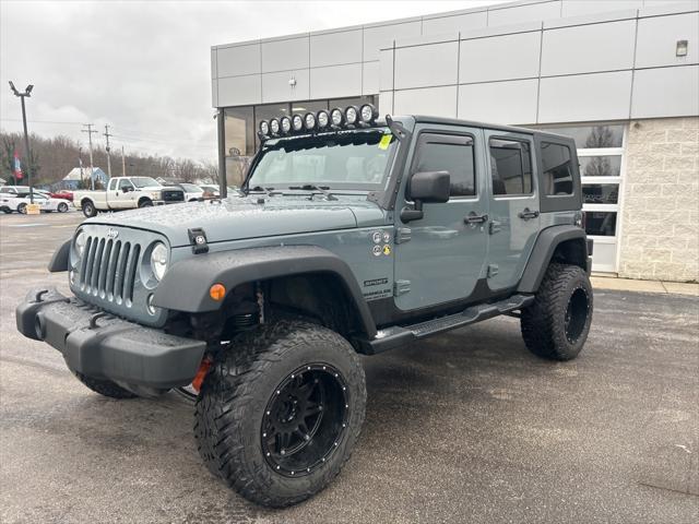 used 2014 Jeep Wrangler Unlimited car, priced at $15,186