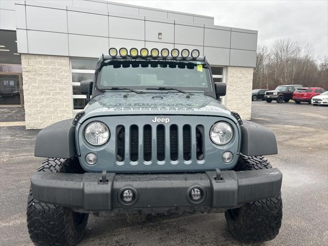 used 2014 Jeep Wrangler Unlimited car, priced at $15,186