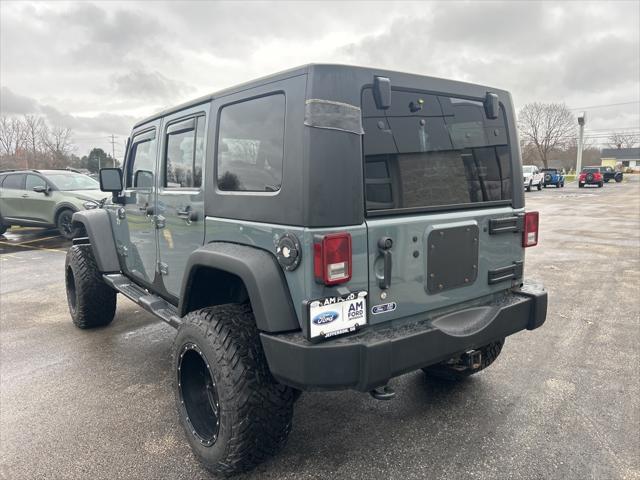 used 2014 Jeep Wrangler Unlimited car, priced at $15,186