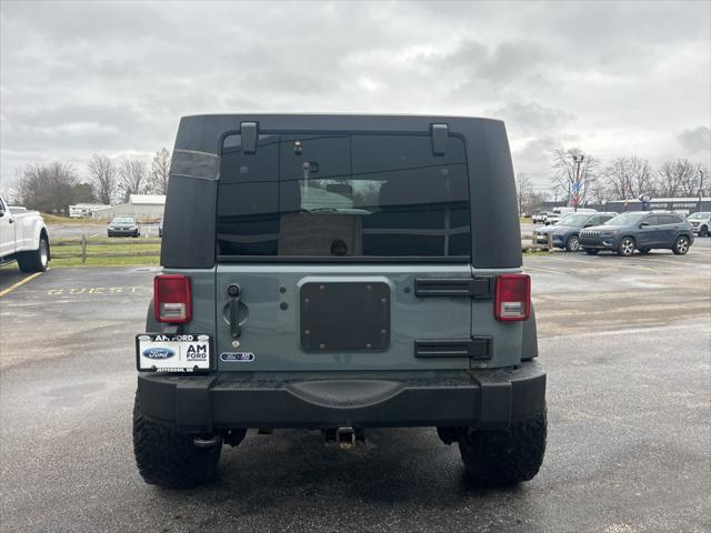 used 2014 Jeep Wrangler Unlimited car, priced at $15,186