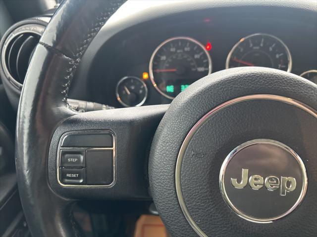 used 2014 Jeep Wrangler Unlimited car, priced at $15,186