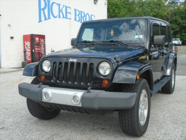 used 2010 Jeep Wrangler Unlimited car, priced at $12,950