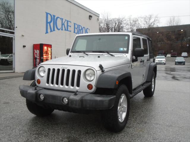 used 2010 Jeep Wrangler Unlimited car, priced at $13,900