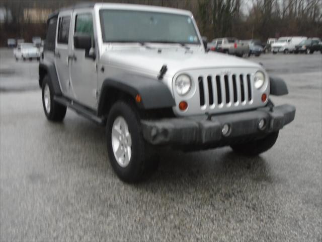 used 2010 Jeep Wrangler Unlimited car, priced at $13,900