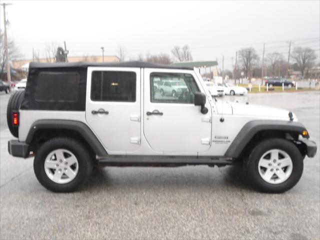 used 2010 Jeep Wrangler Unlimited car, priced at $13,900