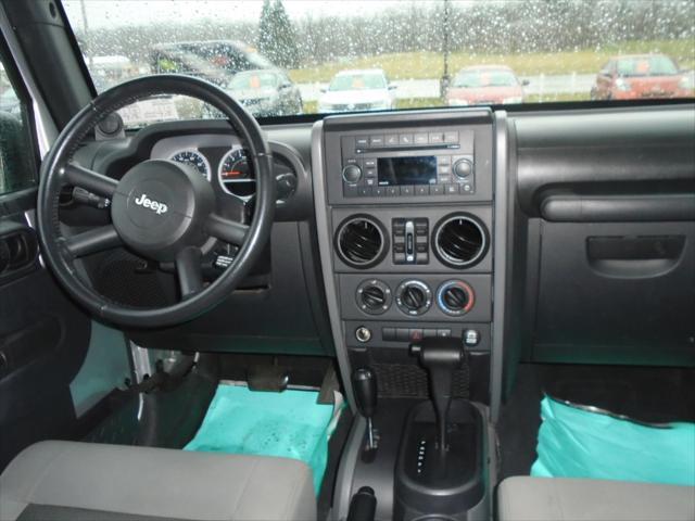 used 2010 Jeep Wrangler Unlimited car, priced at $13,900