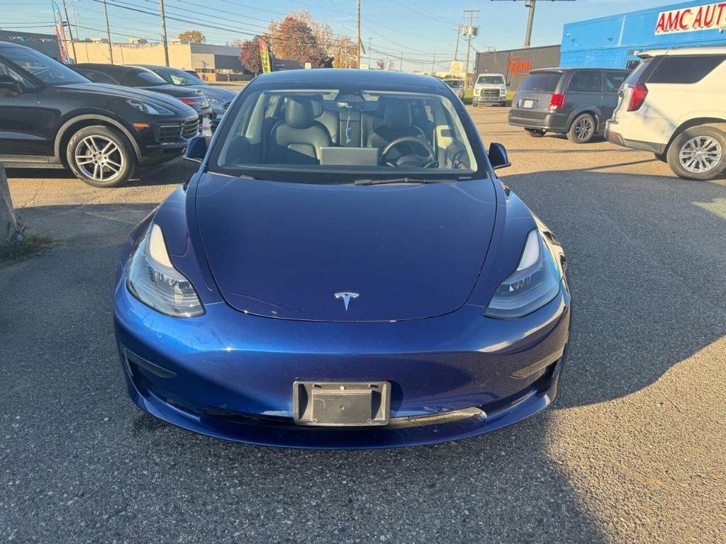 used 2023 Tesla Model 3 car, priced at $24,900