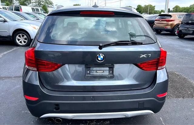 used 2013 BMW X1 car, priced at $4,997