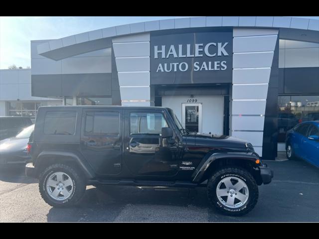 used 2010 Jeep Wrangler Unlimited car, priced at $13,997