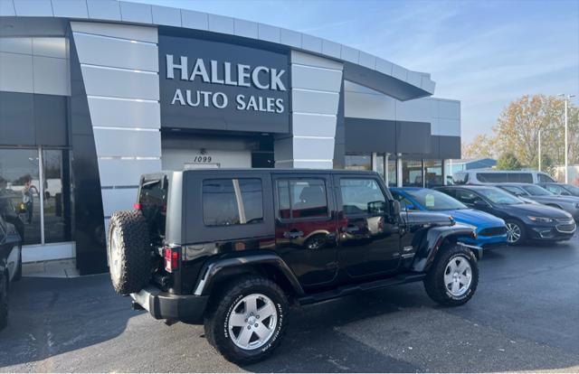 used 2010 Jeep Wrangler Unlimited car, priced at $13,997