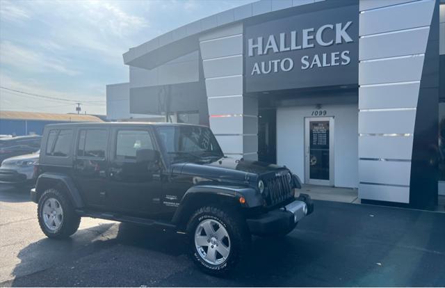 used 2010 Jeep Wrangler Unlimited car, priced at $13,997