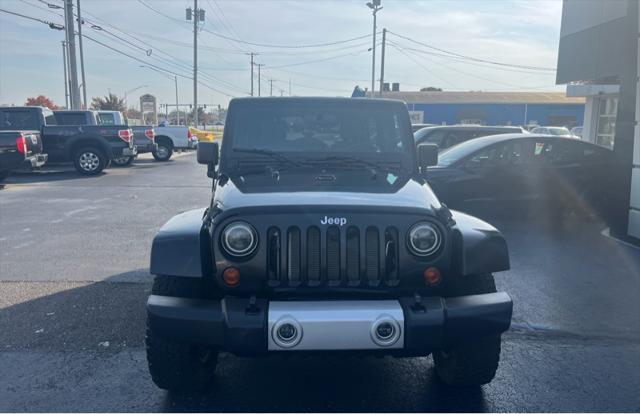 used 2010 Jeep Wrangler Unlimited car, priced at $13,997