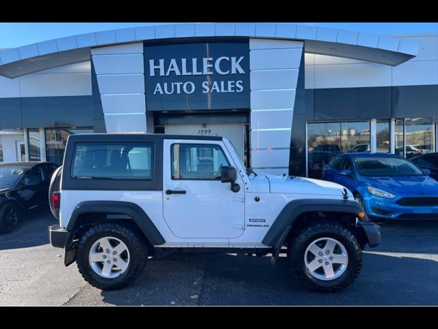 used 2014 Jeep Wrangler car, priced at $13,997