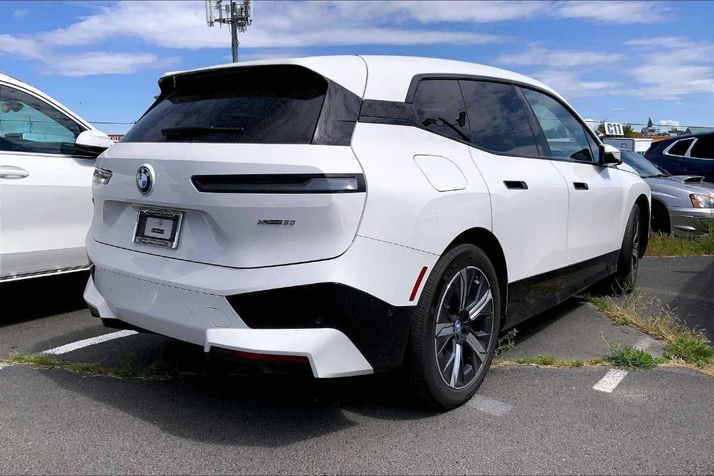 used 2024 BMW iX car, priced at $67,062