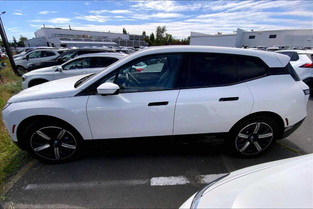 used 2024 BMW iX car, priced at $67,062