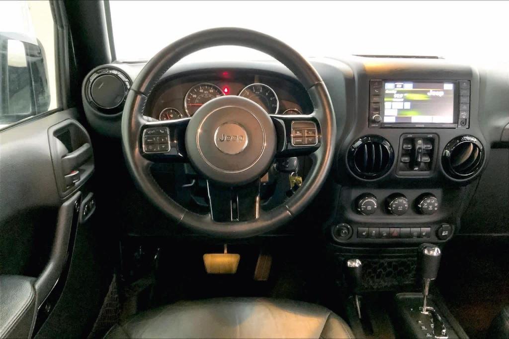 used 2015 Jeep Wrangler Unlimited car, priced at $19,646
