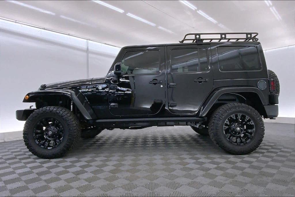 used 2015 Jeep Wrangler Unlimited car, priced at $19,646