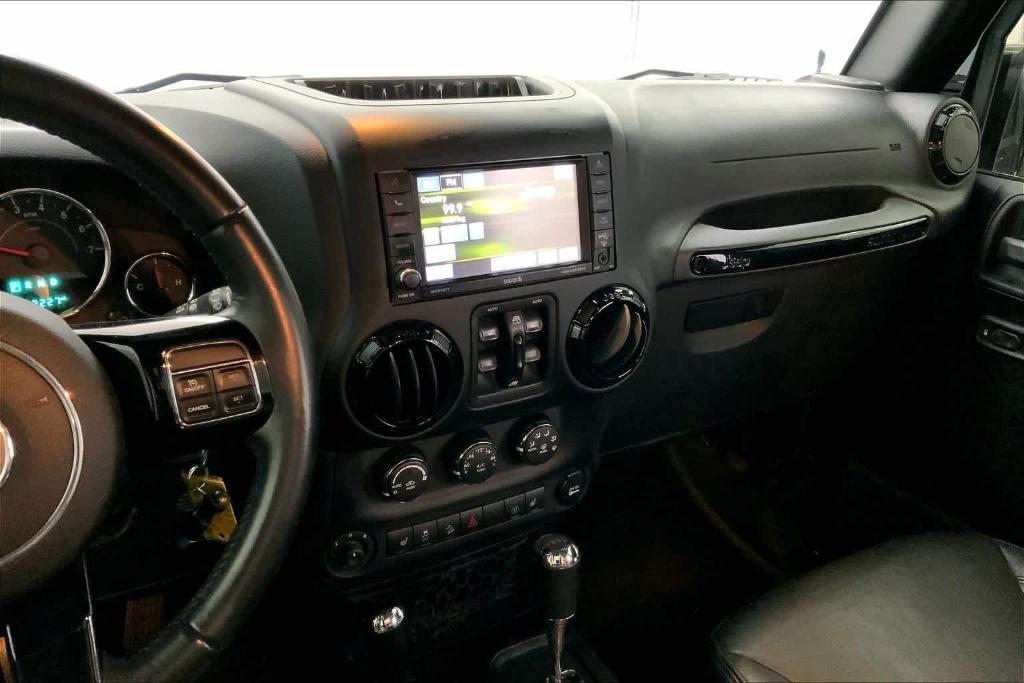 used 2015 Jeep Wrangler Unlimited car, priced at $19,646