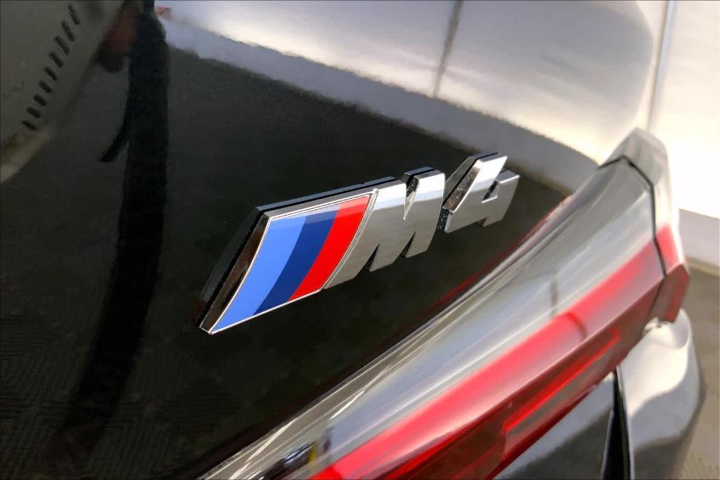 used 2024 BMW M4 car, priced at $82,457