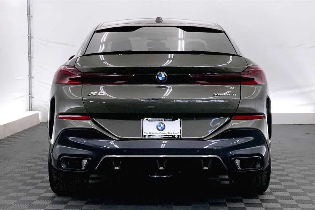 new 2025 BMW X6 car, priced at $86,535