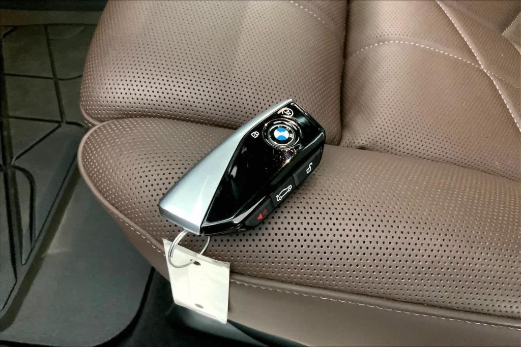 used 2024 BMW 740 car, priced at $104,933