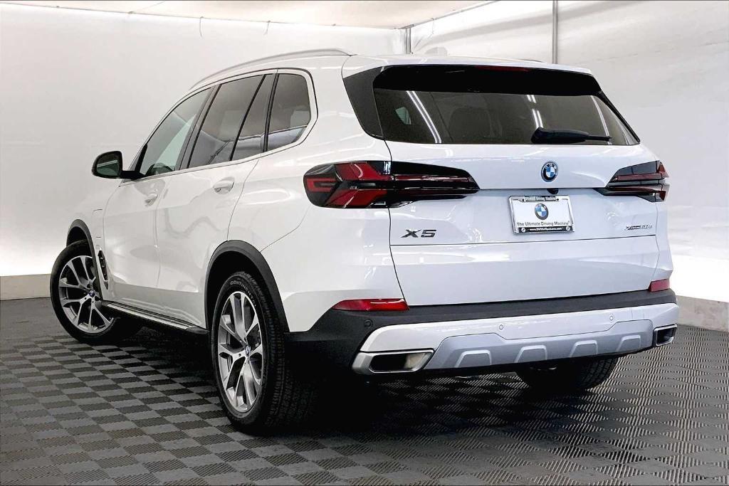 used 2025 BMW X5 PHEV car, priced at $68,722