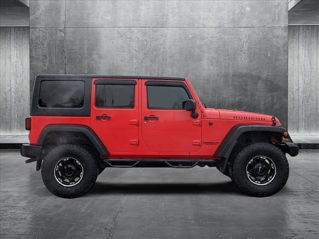 used 2013 Jeep Wrangler Unlimited car, priced at $16,995