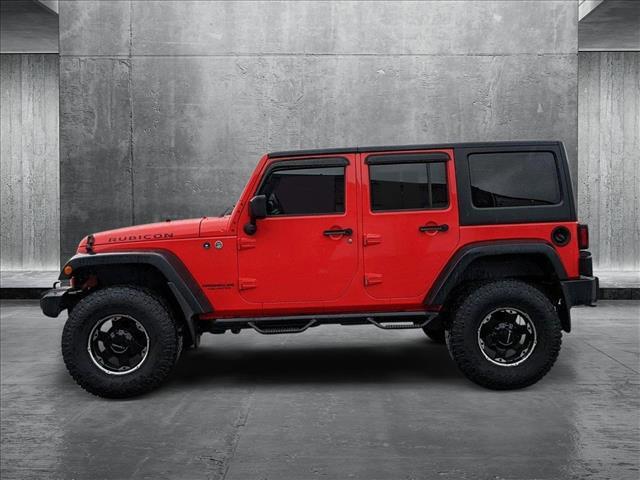 used 2013 Jeep Wrangler Unlimited car, priced at $16,995