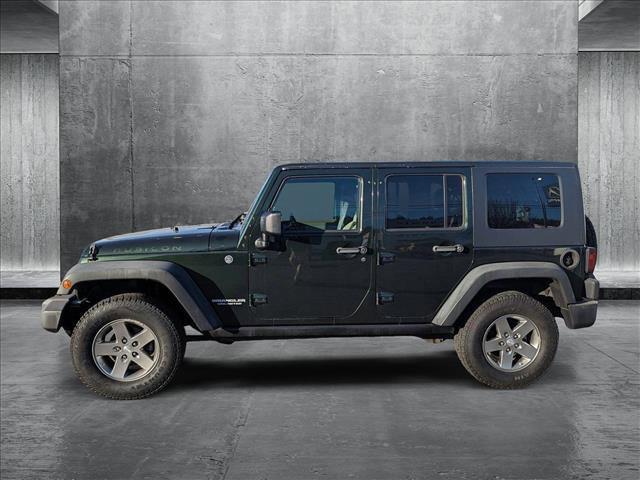 used 2010 Jeep Wrangler Unlimited car, priced at $14,645